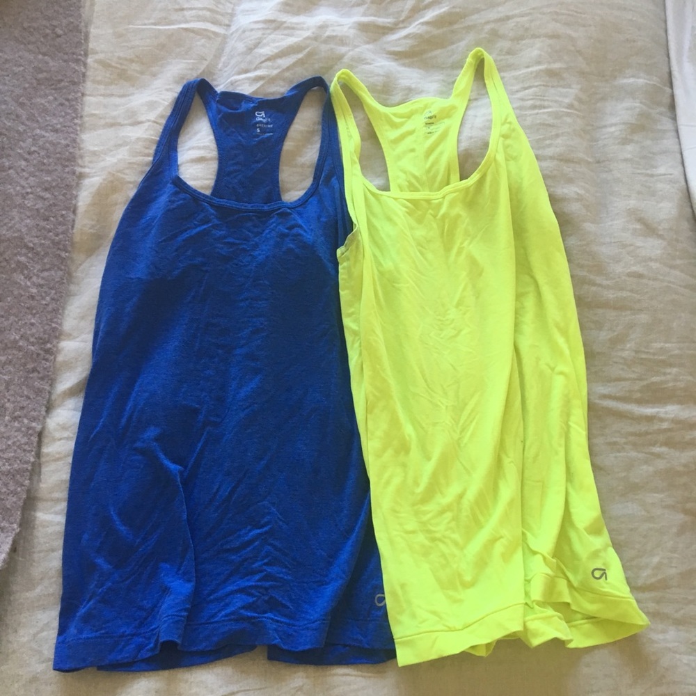 TWO workout tanks